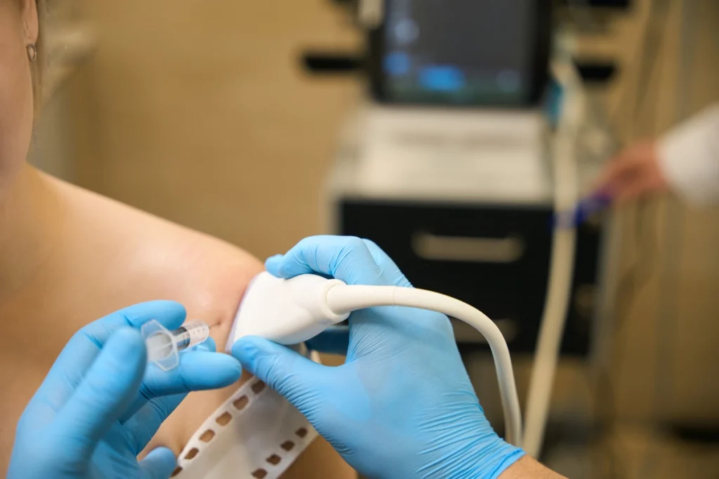 surgeon performing ultrasound guided shoulder arth 2024 10 18 17 57 18 utc